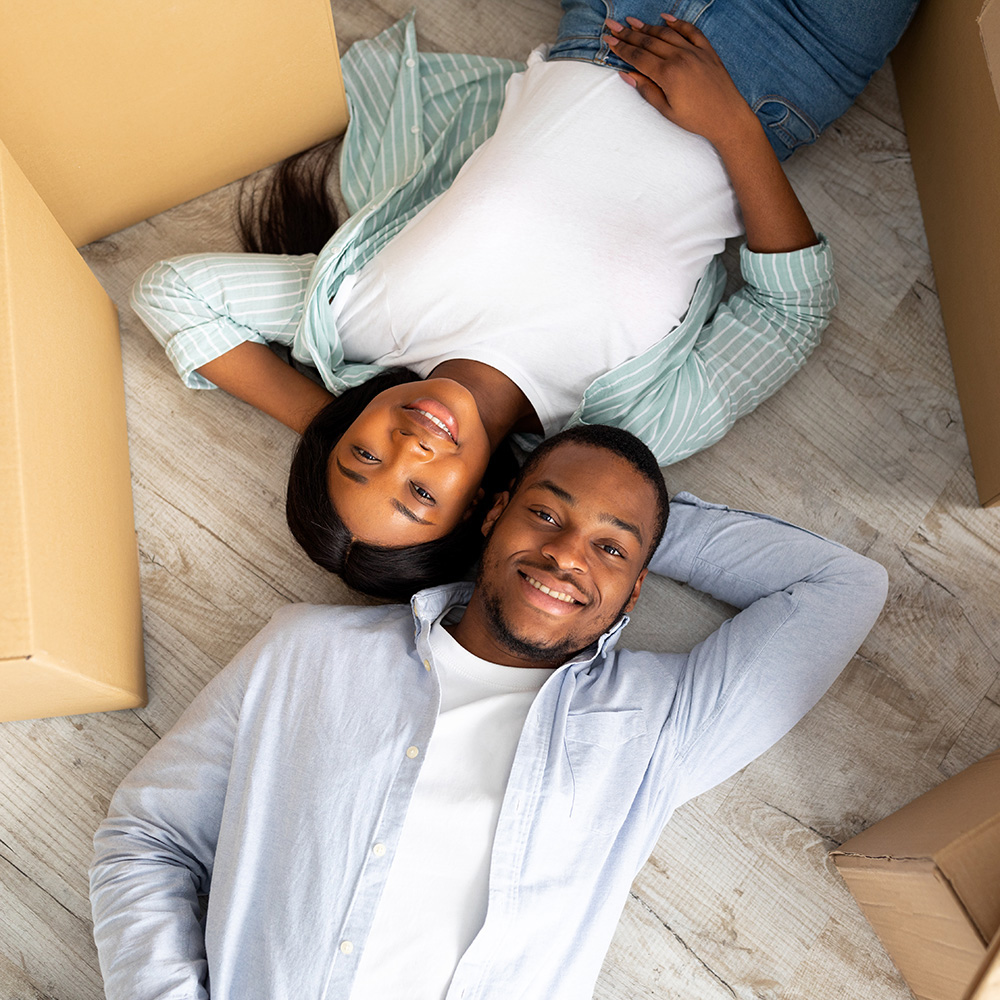 Happy couple in their new home