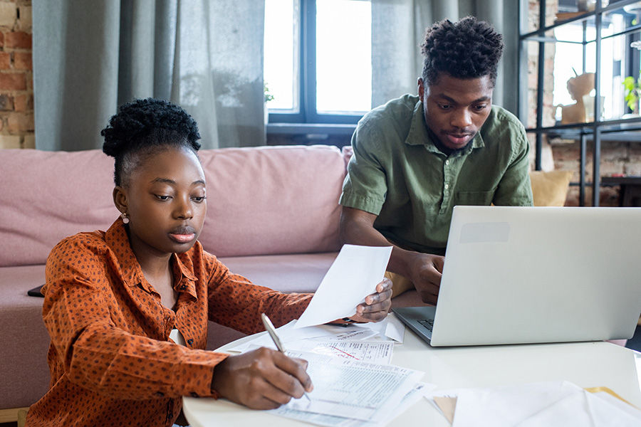 two colleagues working on financials