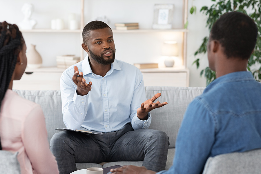 a consultation with a home builder and clients